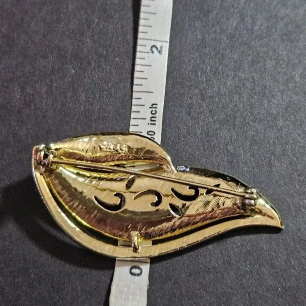 AJC vintage gold tone brooch